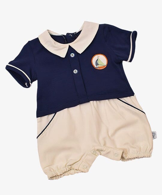 Nical baby romper in navy and beige colors.